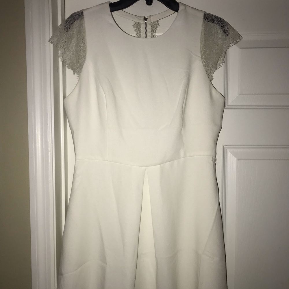Boutique white dress with lace